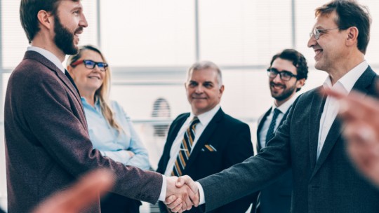 shaking hands oveer business deal